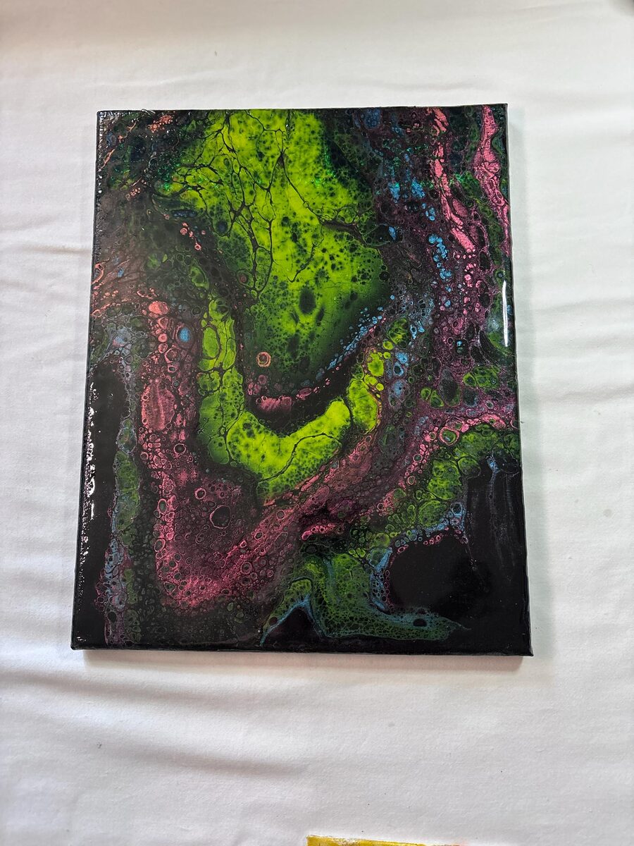 Abstract green, pink, blue, and black fluid painting