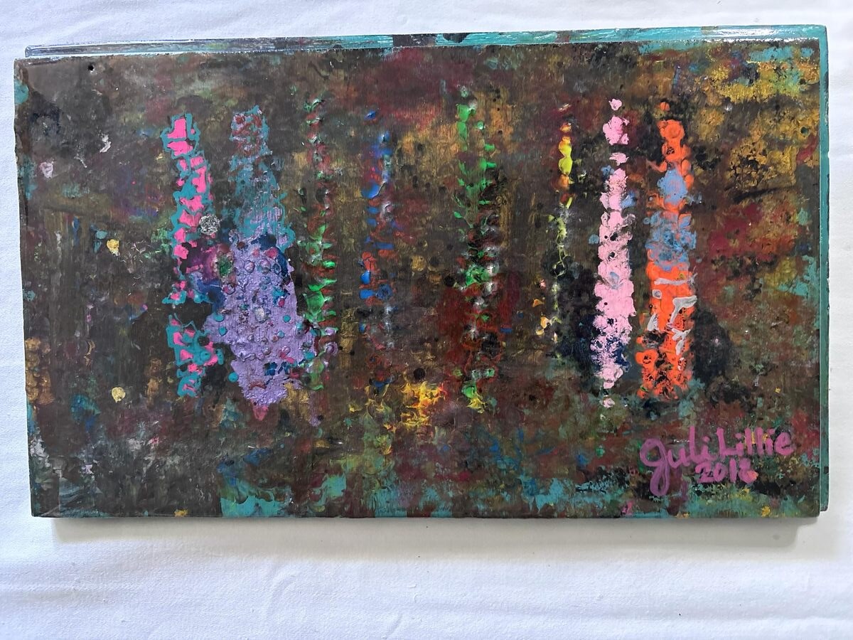 Landscape view of abstract layered mixed-color painting with turquoise edges