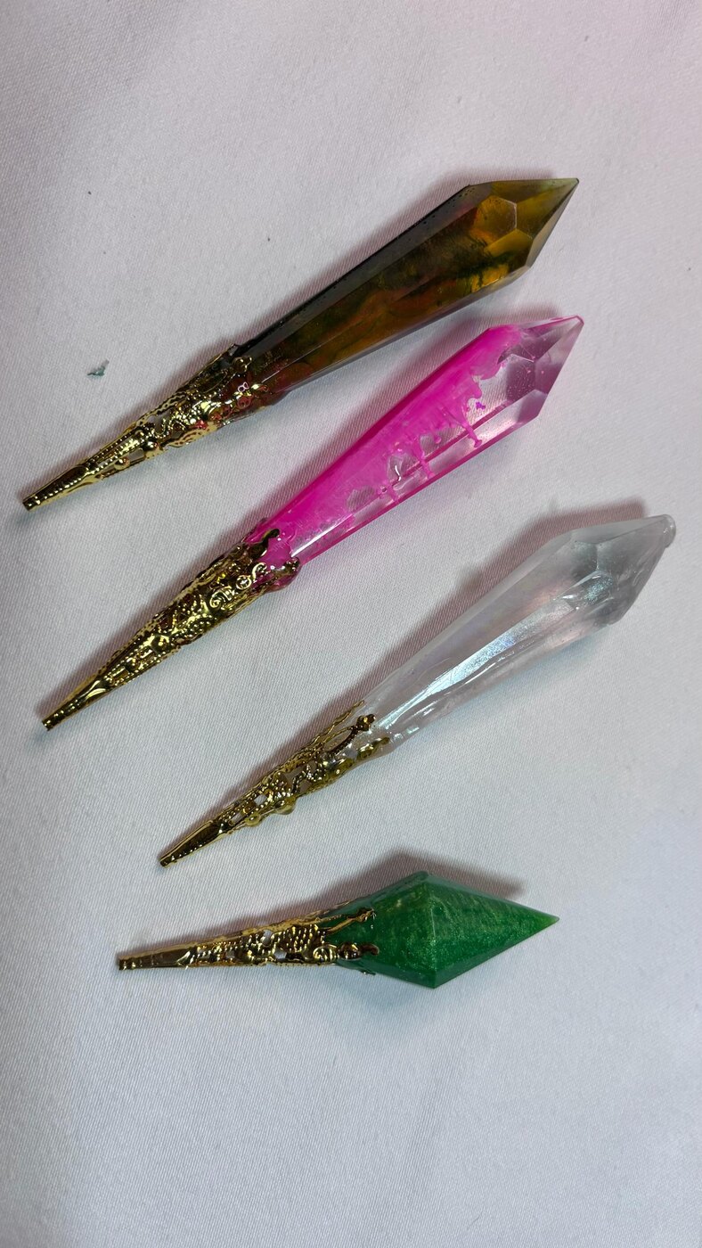Collection of handmade resin crystal wands with gold handles