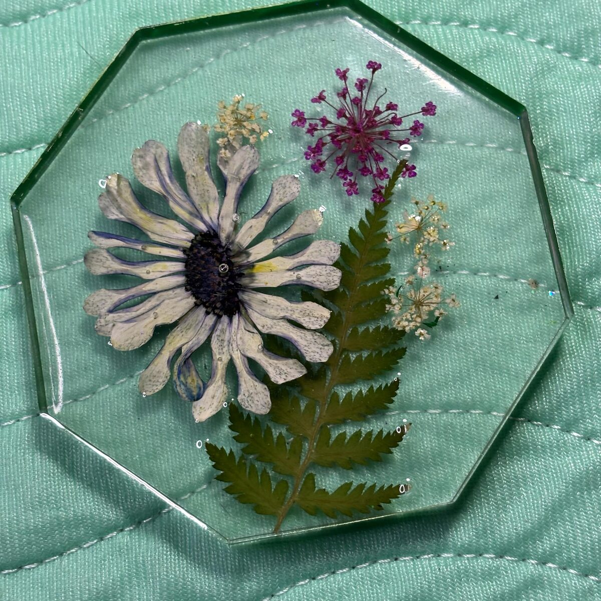 Clear octagon resin tray with daisy, fern, and small flowers