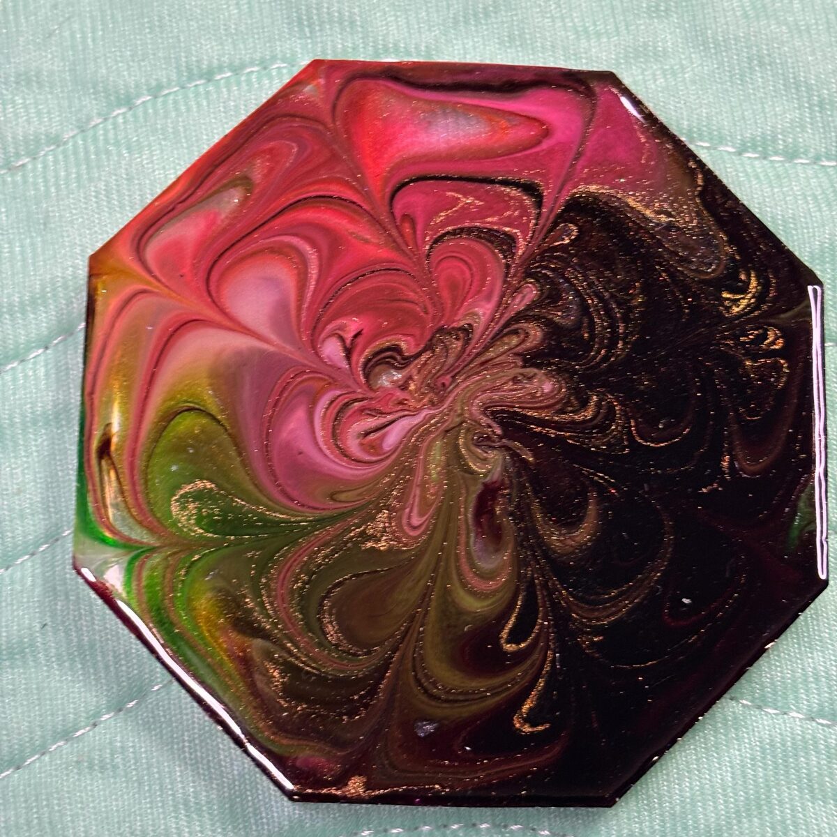 Pink, black, green, and gold swirled octagon resin tray