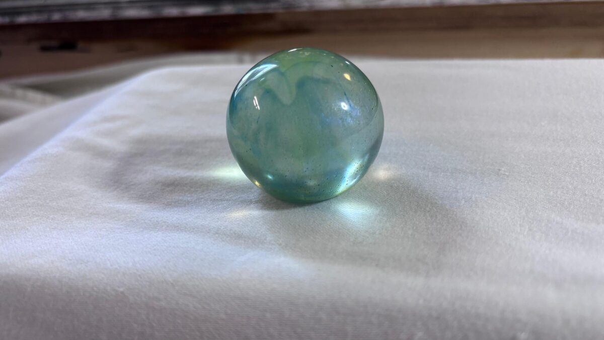 Handmade teal resin sphere